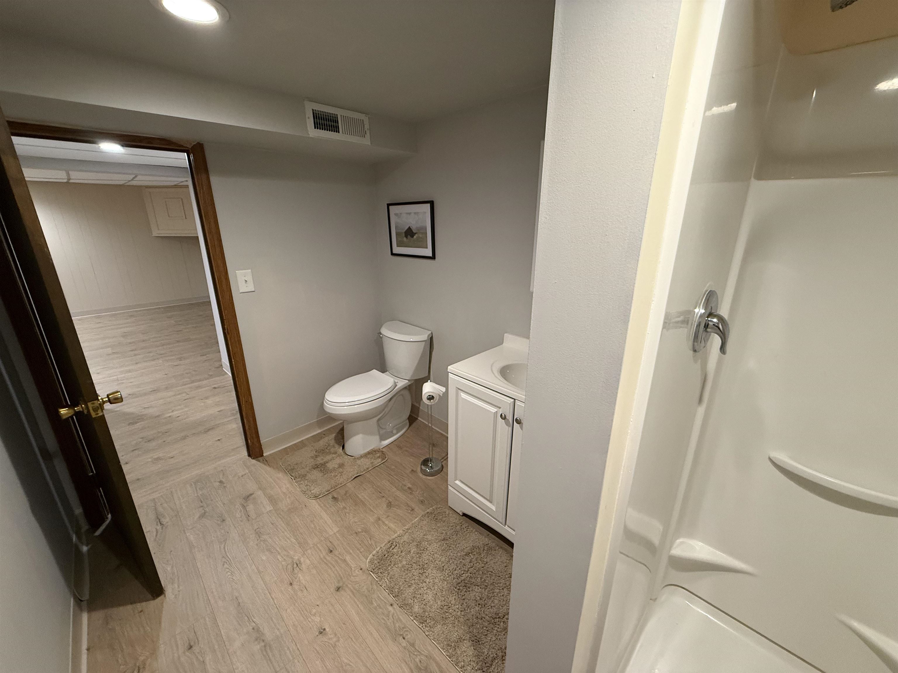 4524 Newcastle Road Rockford, IL 61108 - Photo 18 of 24 a bathroom with a sink and a toilet