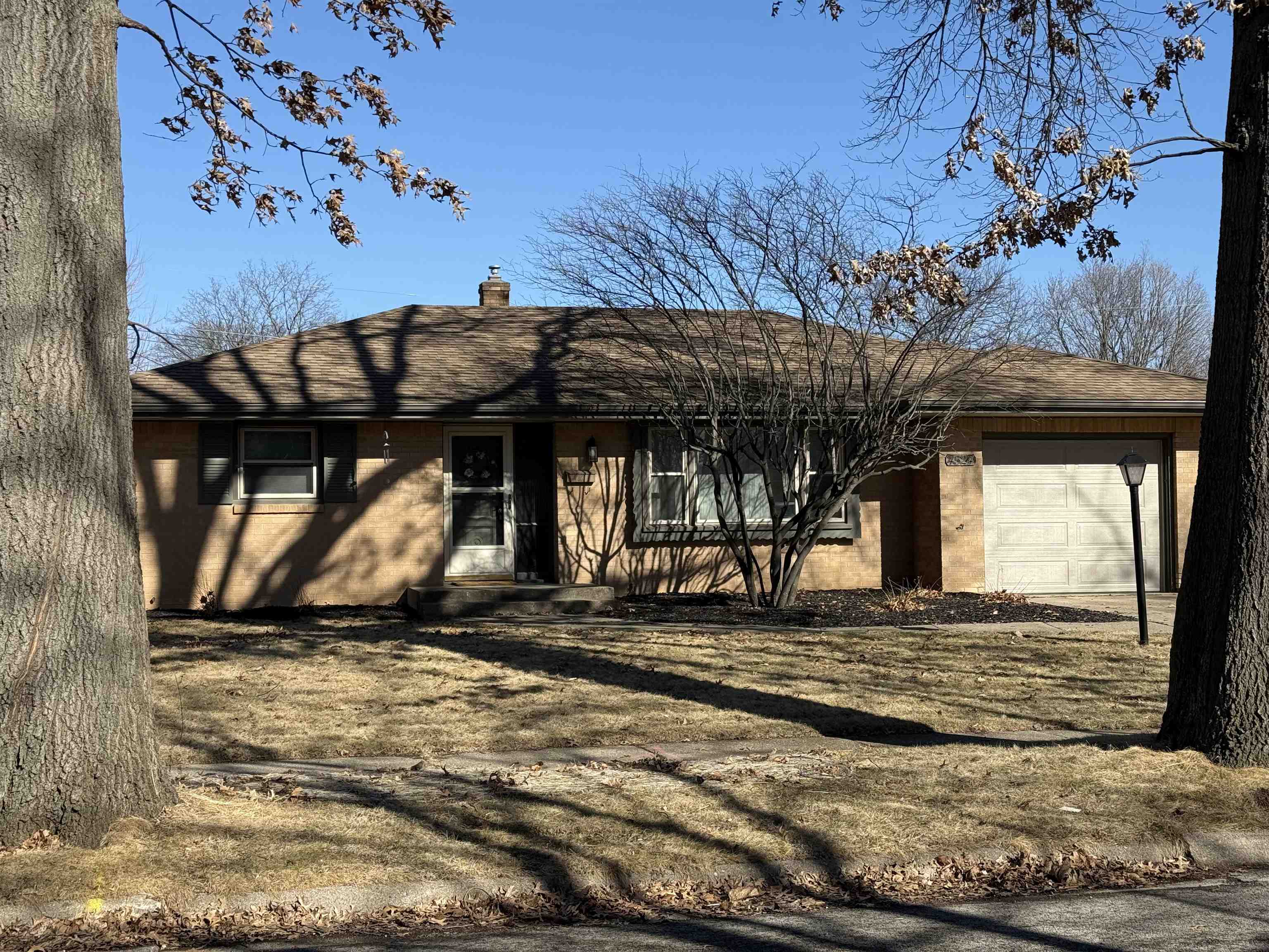 4524 Newcastle Road Rockford, IL 61108 - Photo 2 of 24 a view of a house with a roof deck