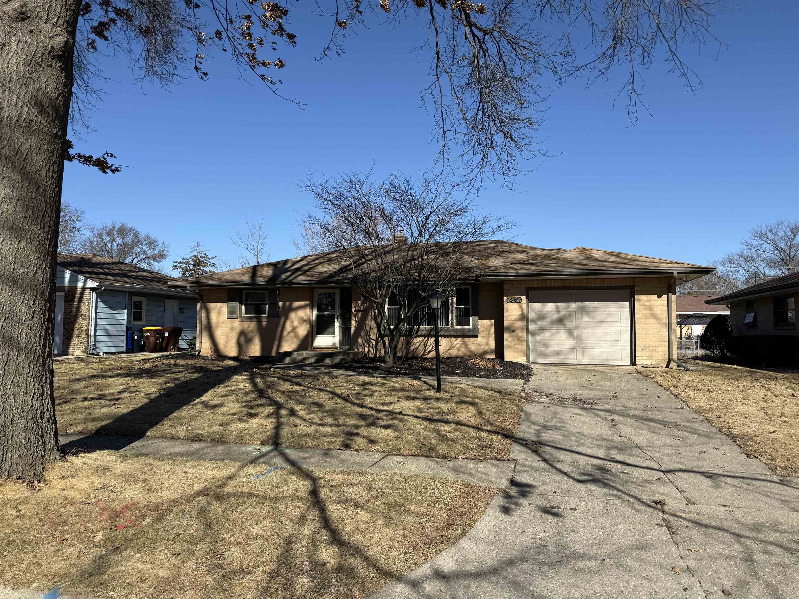 4524 Newcastle Road Rockford, IL 61108 - Photo 24 of 24 a view of a house with a yard