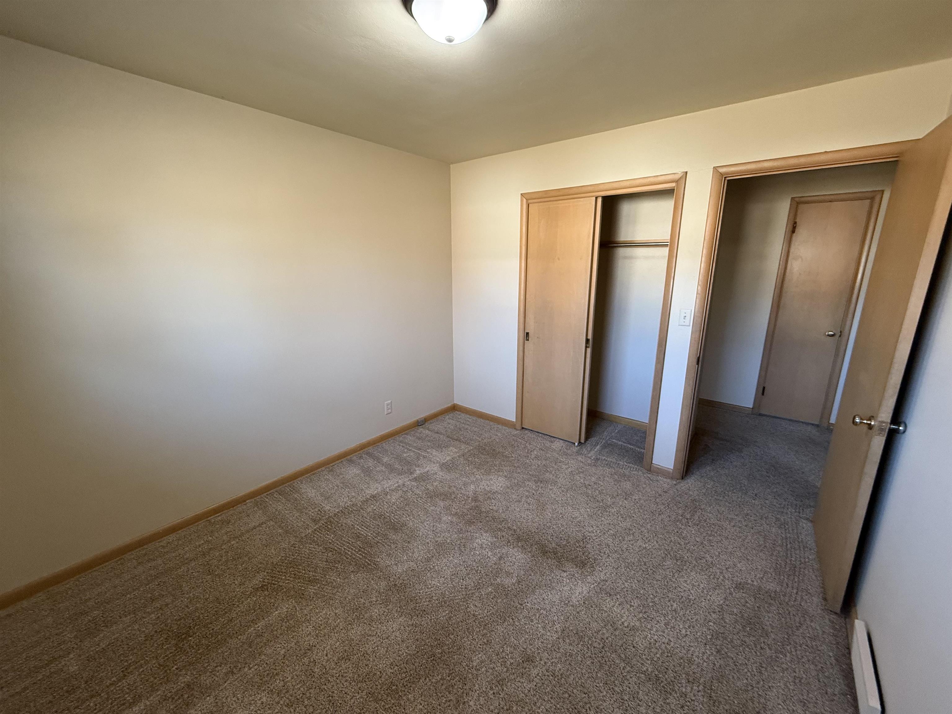 4524 Newcastle Road Rockford, IL 61108 - Photo 10 of 24 an empty room with closet area