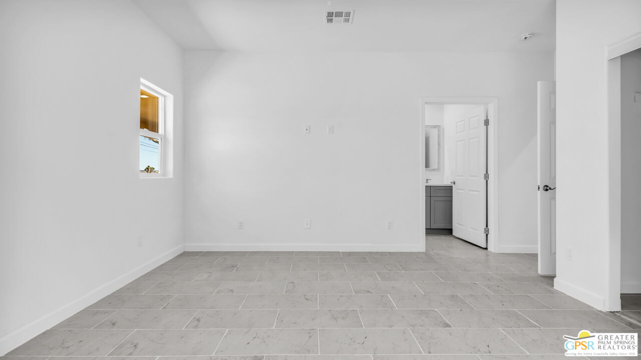 7160 Olympic Road Joshua Tree, CA 92252 - Photo 36 of 58 an empty room with closet
