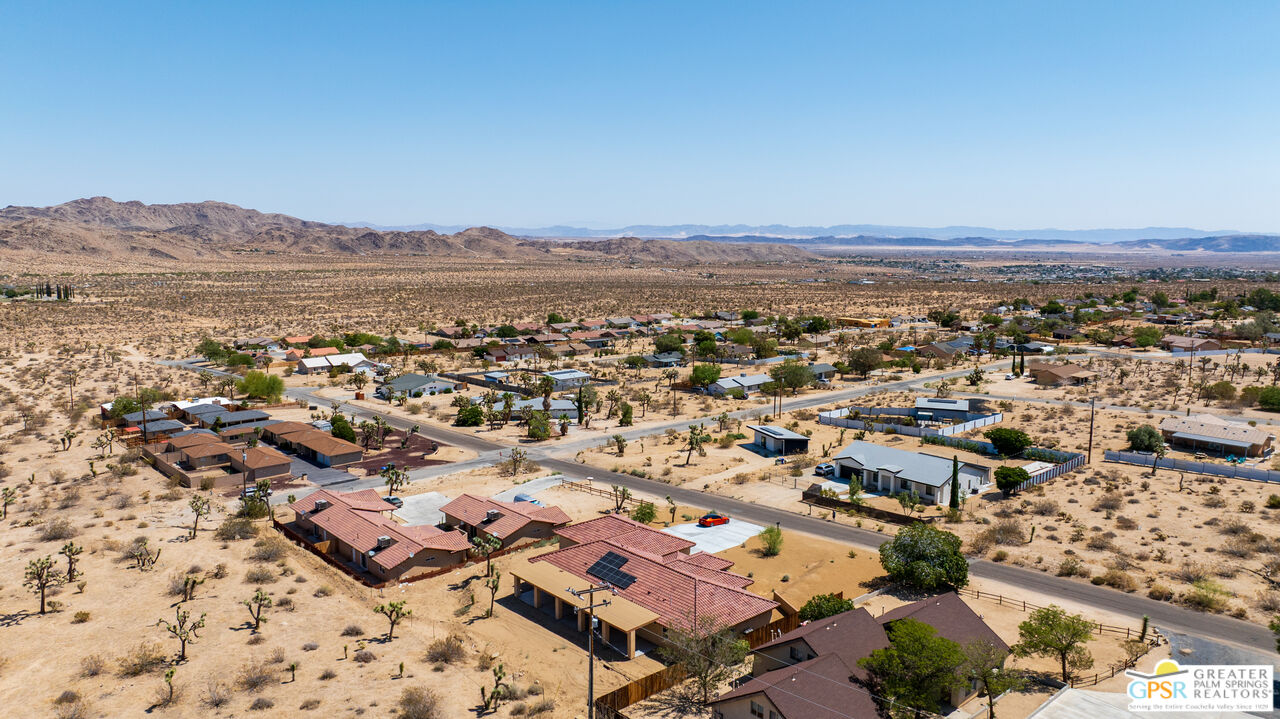 7160 Olympic Road Joshua Tree, CA 92252 - Photo 50 of 58 an aerial view of residential house and ocean