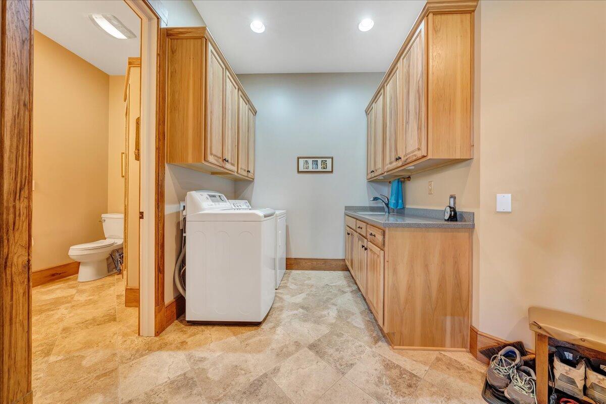 144 Seven Ridges Road Hot Springs, VA 24445 - Photo 39 of 89 a view of a hallway with washer and dryer