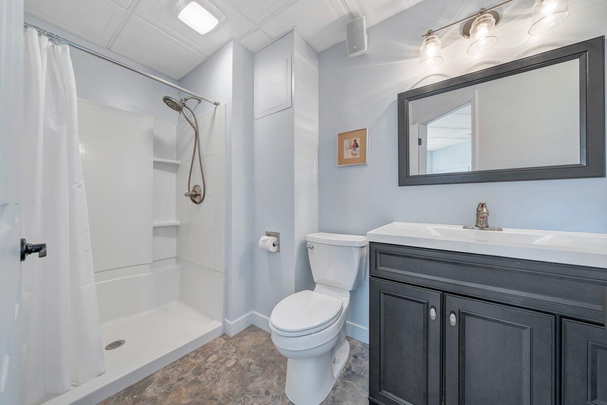 144 Seven Ridges Road Hot Springs, VA 24445 - Photo 56 of 99 a bathroom with a sink toilet and shower