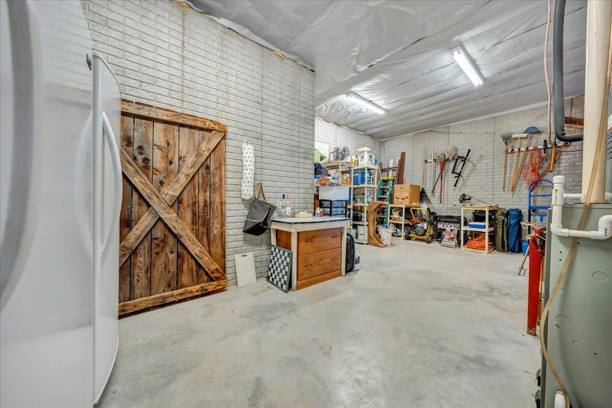 144 Seven Ridges Road Hot Springs, VA 24445 - Photo 64 of 89 a view of a livingroom with furniture and a window