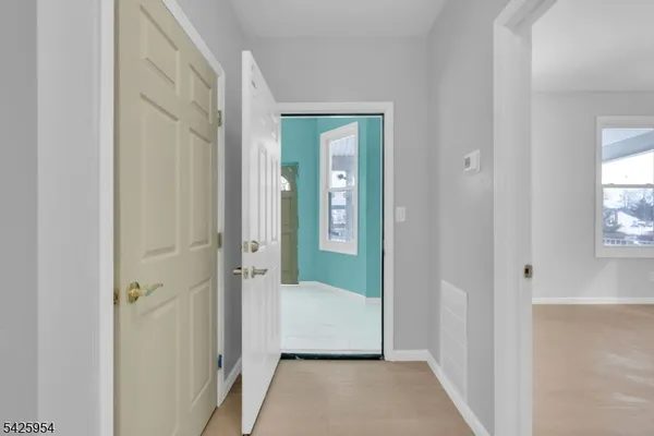a view of a room that has a window in it