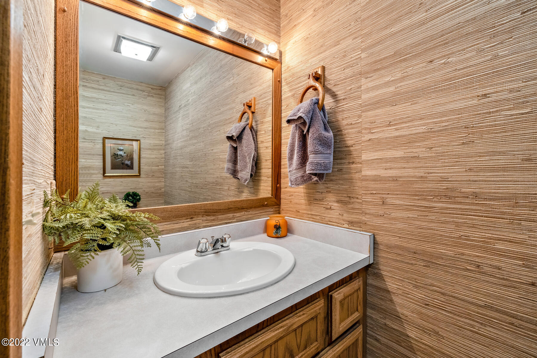 1750 South Frontage Road West, Unit E3 Vail, CO 81657 - Photo 15 of 39 a bathroom with a sink and a mirror
