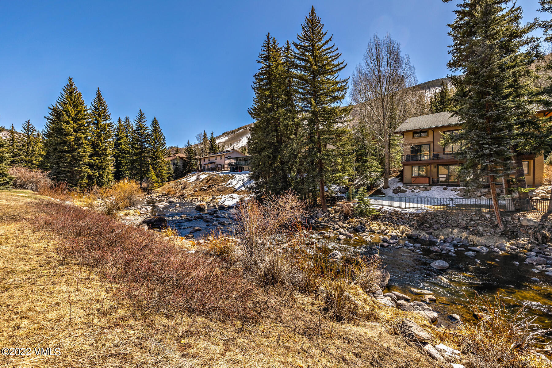 1750 South Frontage Road West, Unit E3 Vail, CO 81657 - Photo 27 of 39 a view of a house with a yard