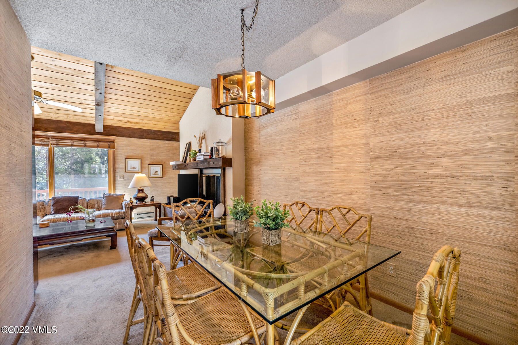 1750 South Frontage Road West, Unit E3 Vail, CO 81657 - Photo 9 of 39 a dining room with furniture and window