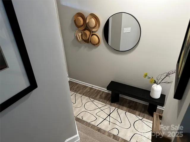 a view of entryway with wooden floor