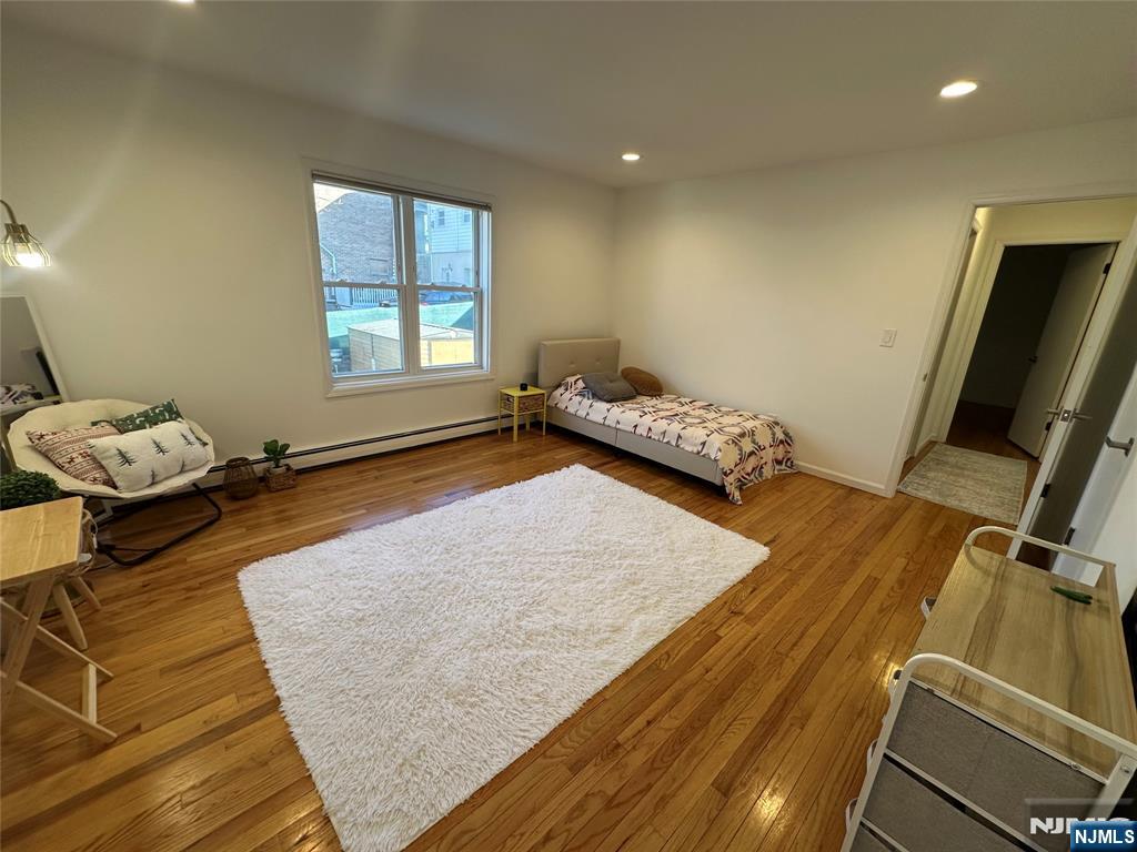 531 Day Avenue, Unit 1 Ridgefield, NJ 07657 - Photo 12 of 20 a bedroom with a bed and a window