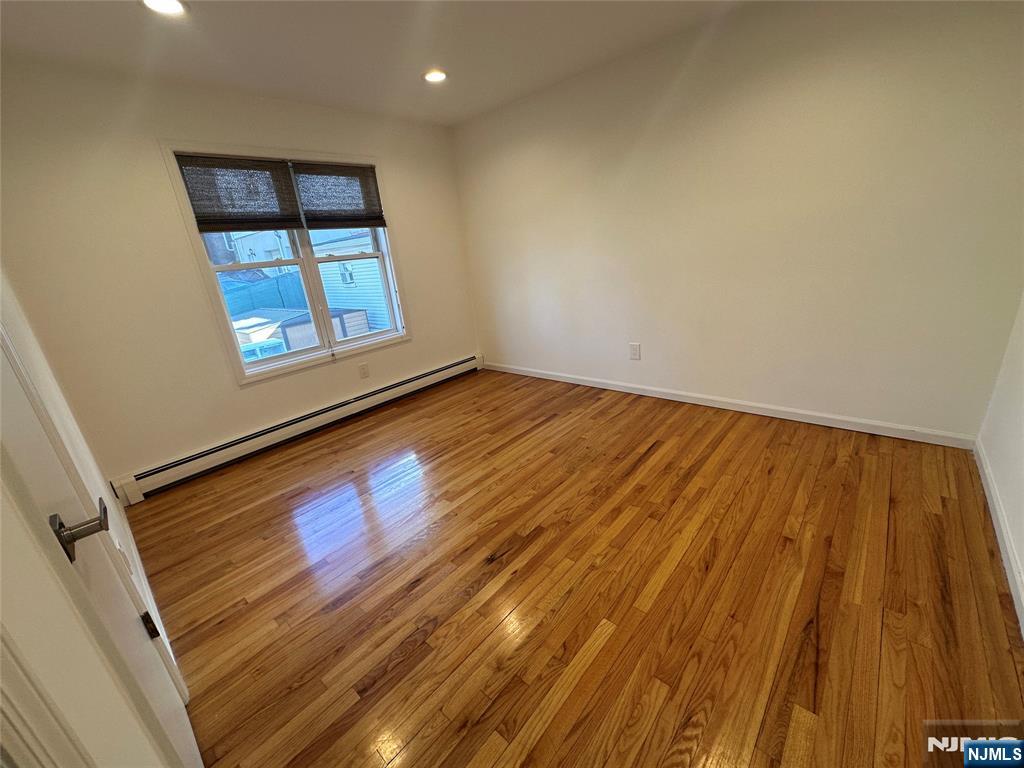 531 Day Avenue, Unit 1 Ridgefield, NJ 07657 - Photo 16 of 20 a view of an empty room and window