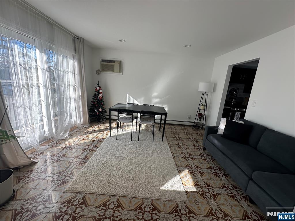 531 Day Avenue, Unit 1 Ridgefield, NJ 07657 - Photo 5 of 20 a living room with furniture and a piano