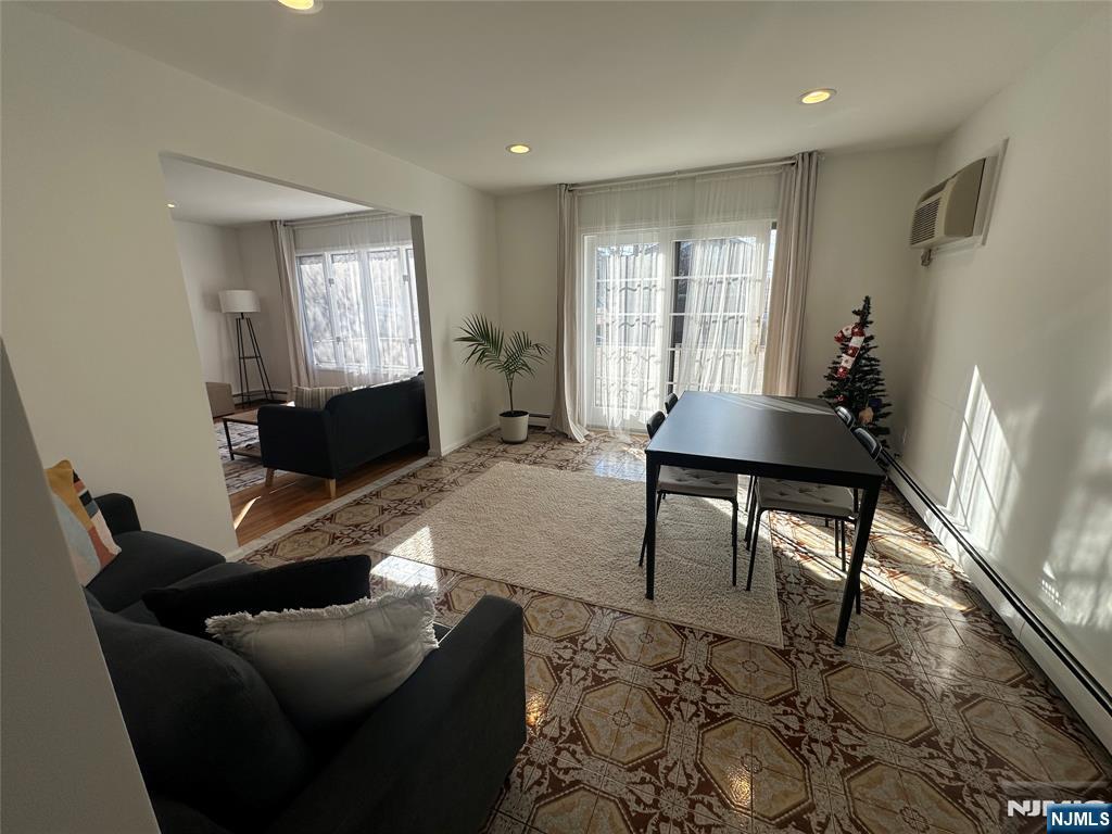 531 Day Avenue, Unit 1 Ridgefield, NJ 07657 - Photo 6 of 20 a living room with furniture and a window