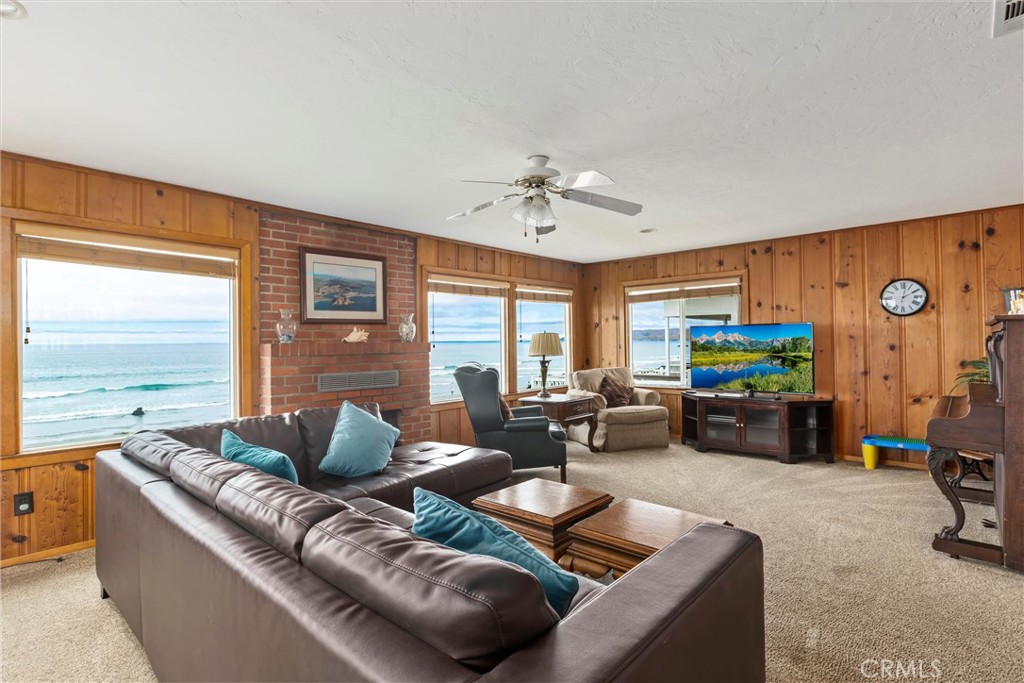 2670 Studio Drive Cayucos, CA 93430 - Photo 30 of 52 a living room with furniture and a flat screen tv