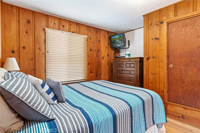 a bathroom with a sink a mirror and a shower curtain