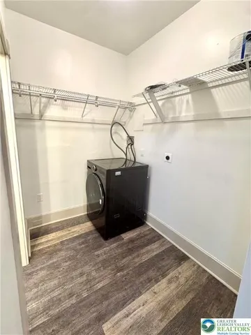 a view of a room with racks on the wall