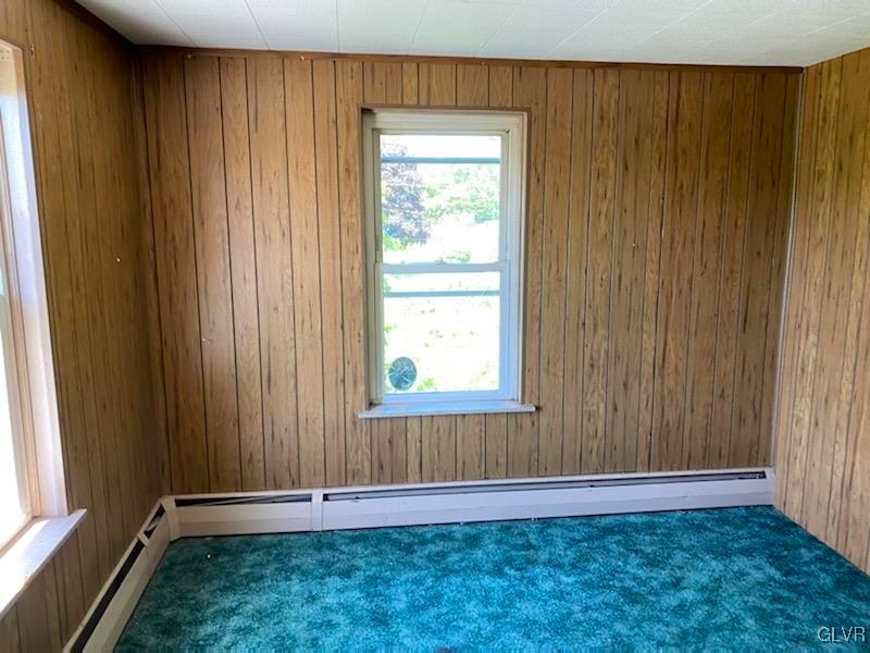 2859 Welshtown Road Slatington, PA 18080 - Photo 13 of 15 an empty room with wooden floor and a window