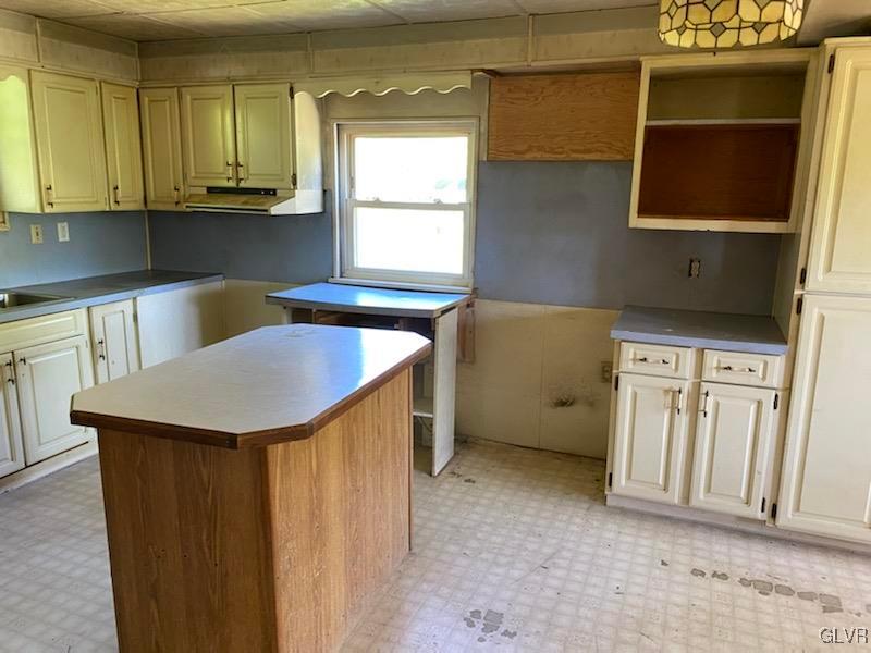 2859 Welshtown Road Slatington, PA 18080 - Photo 9 of 15 a kitchen with stainless steel appliances a stove a sink and a microwave