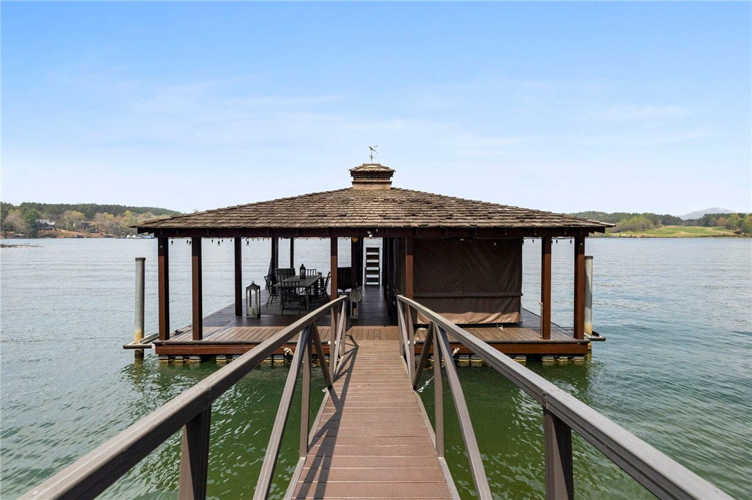 195 Village View Drive Sunset, SC 29685 - Photo 41 of 48 This serene lakefront boathouse offers a private dock for direct water access.