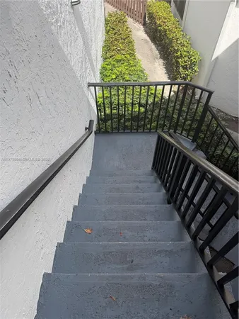 a view of backyard with barbeque oven