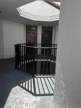 a house view with a backyard space