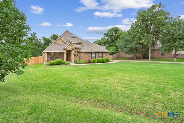 3306 Spring Canyon Road Belton, TX 76513 - Photo 5 of 40 a house view with a garden space