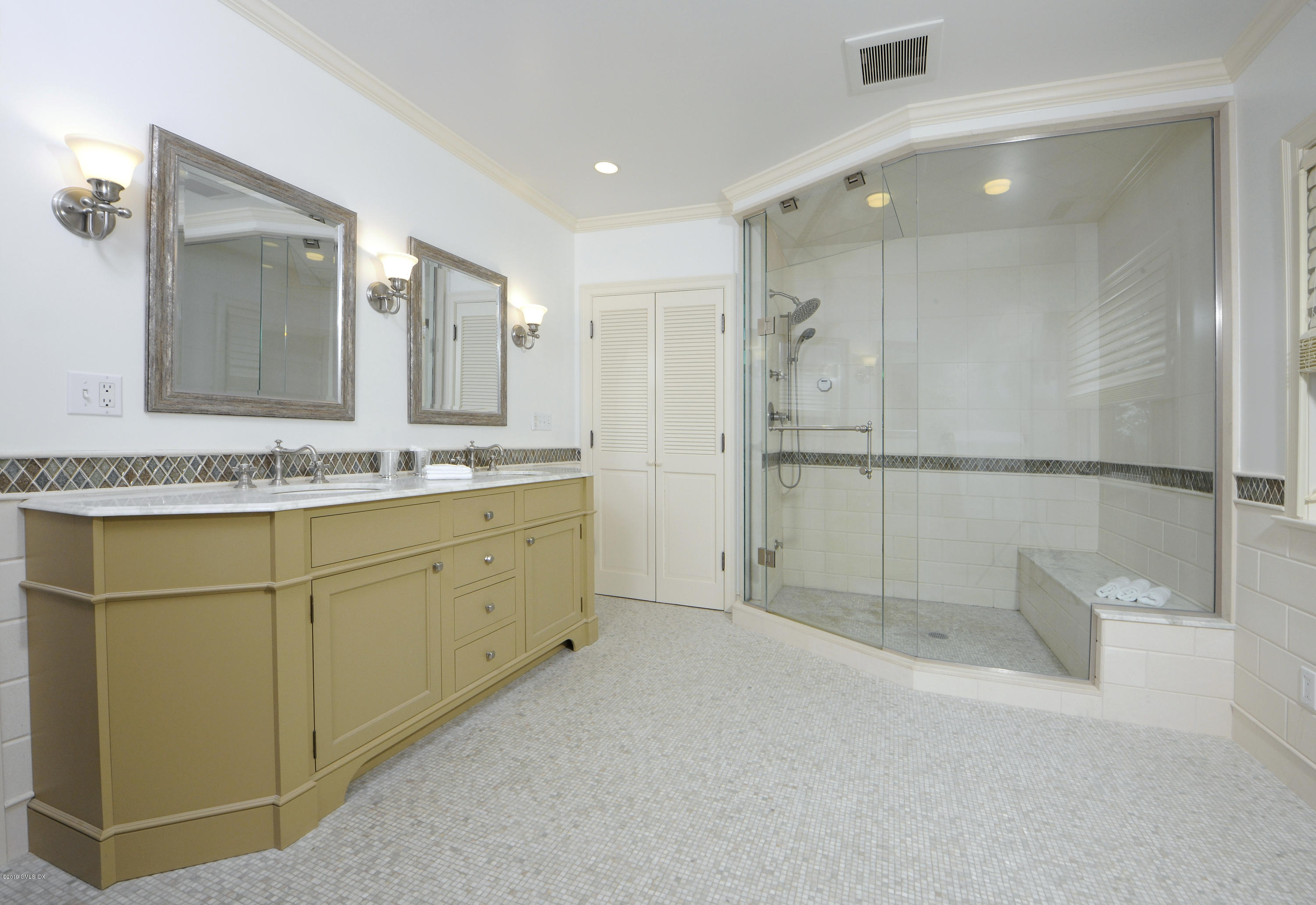 30 Rocky Point Road Old Greenwich, CT 06870 - Photo 15 of 29 a spacious bathroom with a granite countertop sink mirror and a