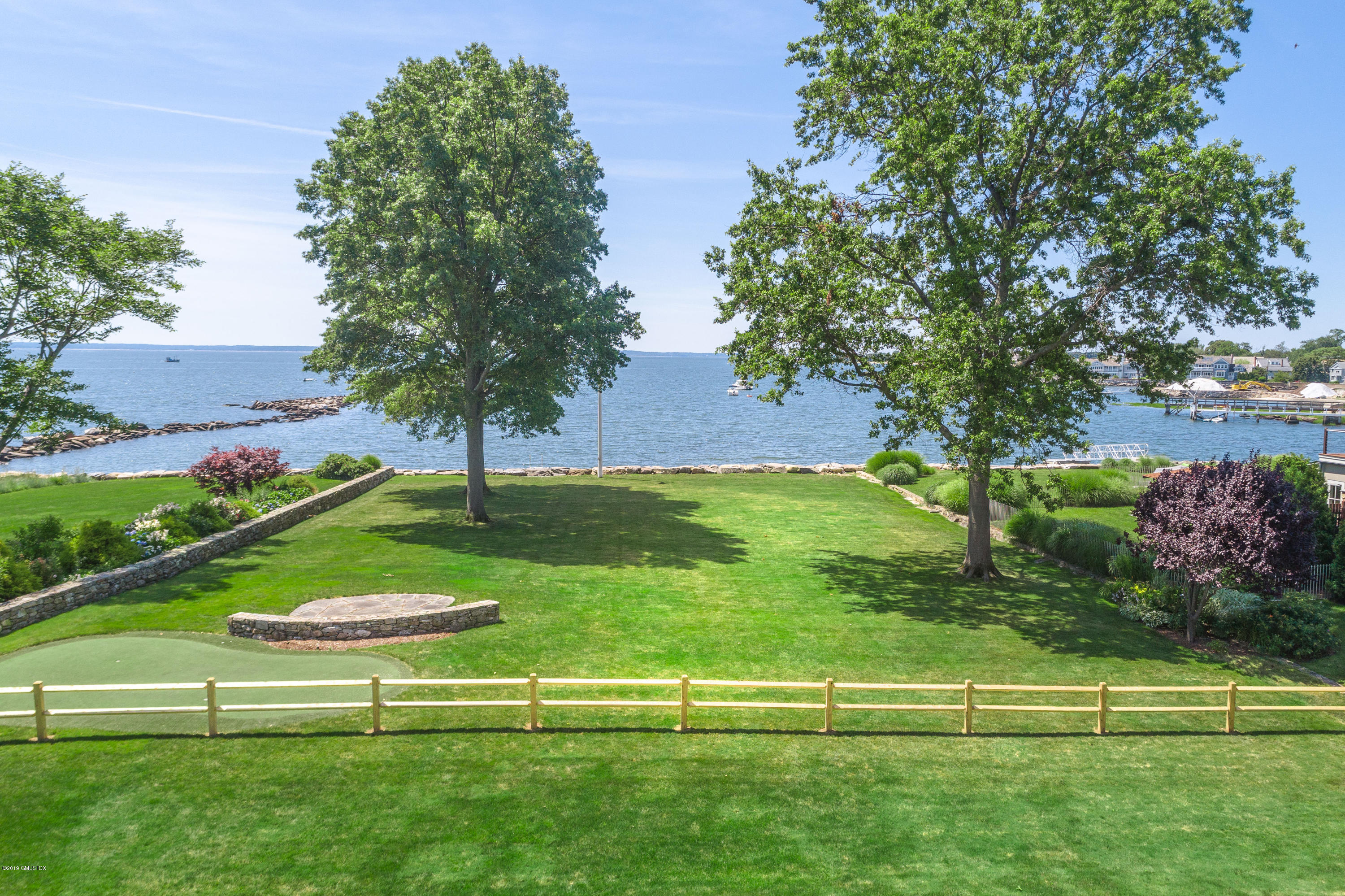 30 Rocky Point Road Old Greenwich, CT 06870 - Photo 25 of 29 a view of an outdoor space and garden