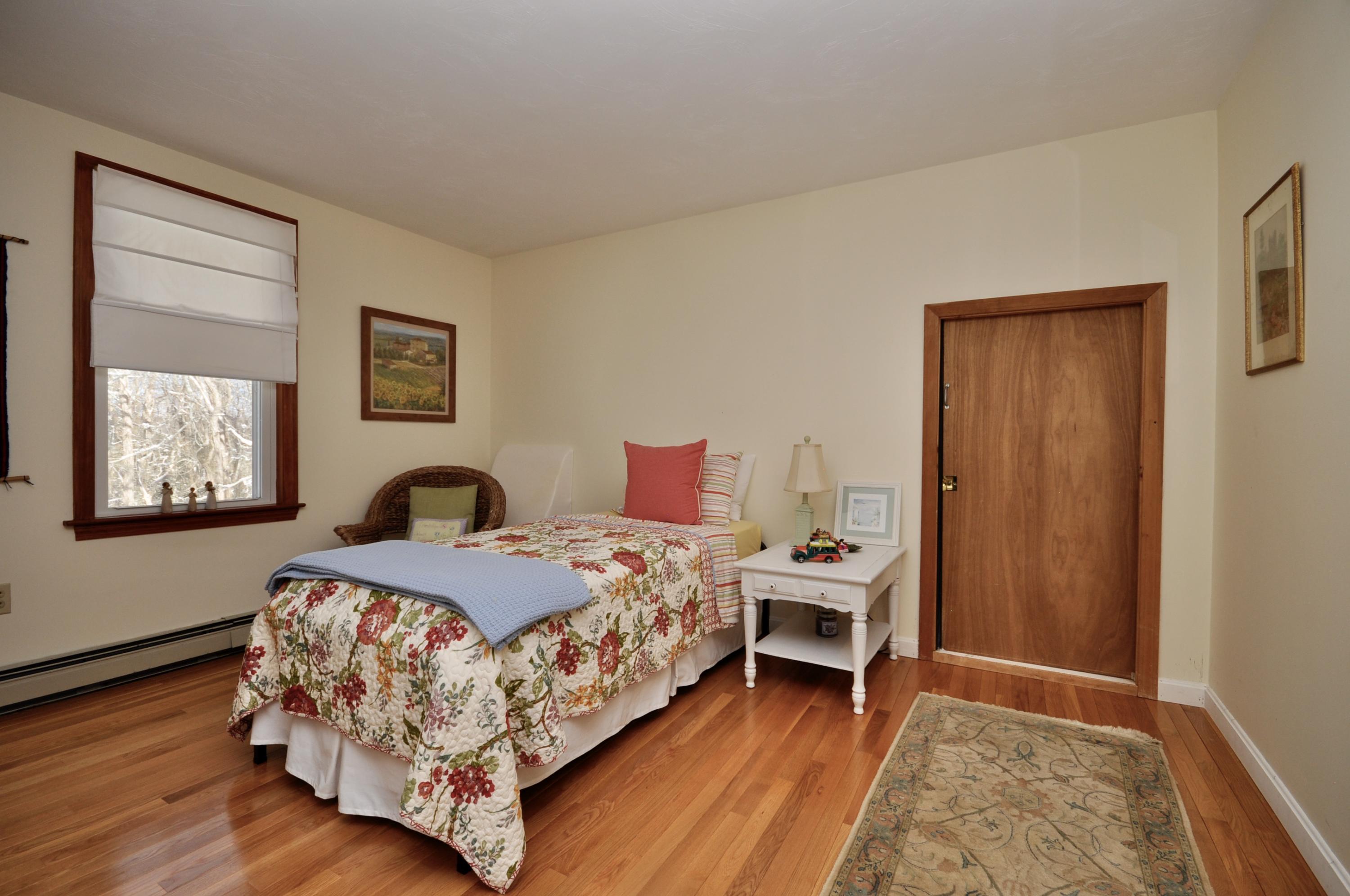 6 Cunningham Road Sagamore Beach, MA 02562 - Photo 22 of 34 a bedroom with a bed and a window