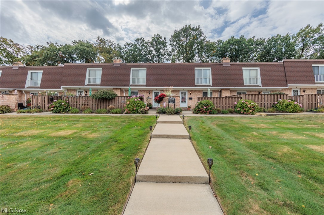 6476 State Road, Unit H8 Cleveland, OH 44134 - Photo 2 of 35 Townhome property featuring a front yard