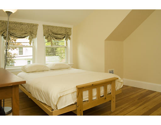 162 Overlook Road Arlington, MA 02474 - Photo 6 of 12 a bedroom with a bed and wooden floor