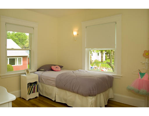 162 Overlook Road Arlington, MA 02474 - Photo 8 of 12 a bedroom with a bed and a window