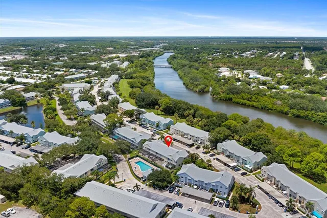 a view of a swimming pool with a lounge chair