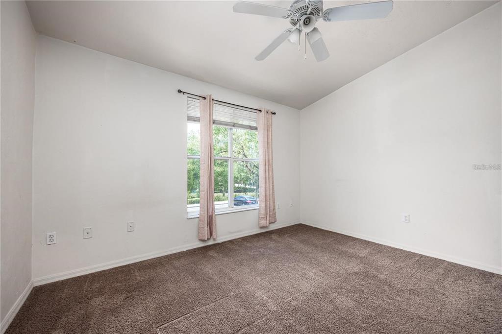3970 Southwest 20th Avenue, Unit 909 Gainesville, FL 32607 - Photo 18 of 22 a view of empty room with window