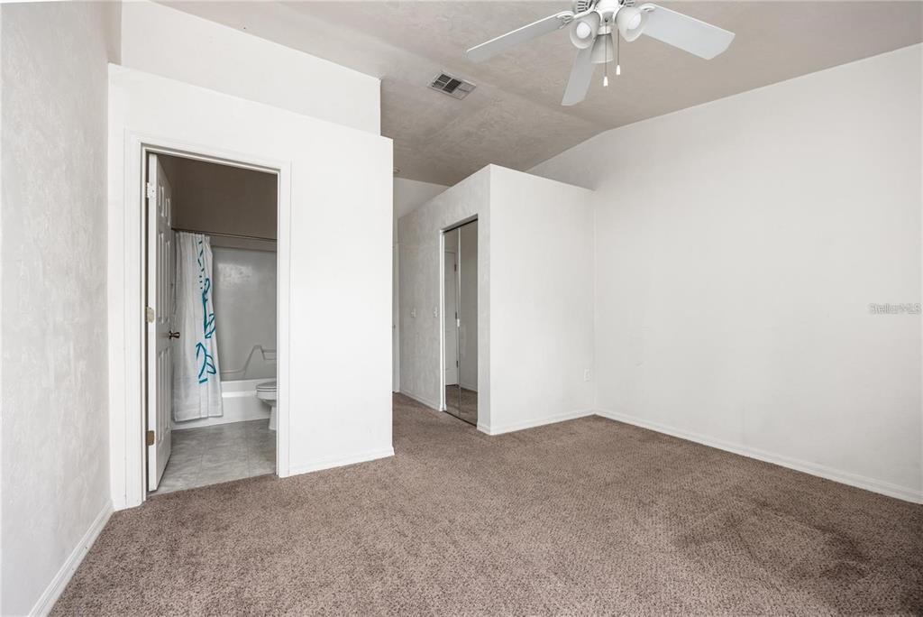3970 Southwest 20th Avenue, Unit 909 Gainesville, FL 32607 - Photo 19 of 22 a view of a big room with chandelier fan