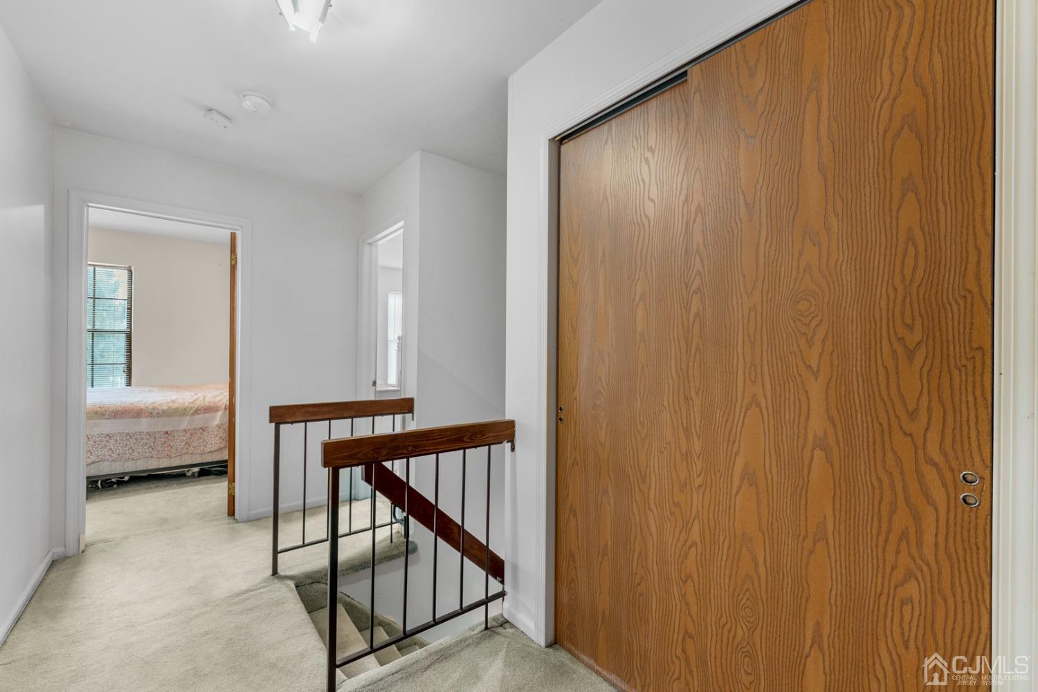 301 Maplecrest Road Edison, NJ 08820 - Photo 12 of 21 a view of a hallway with a bedroom