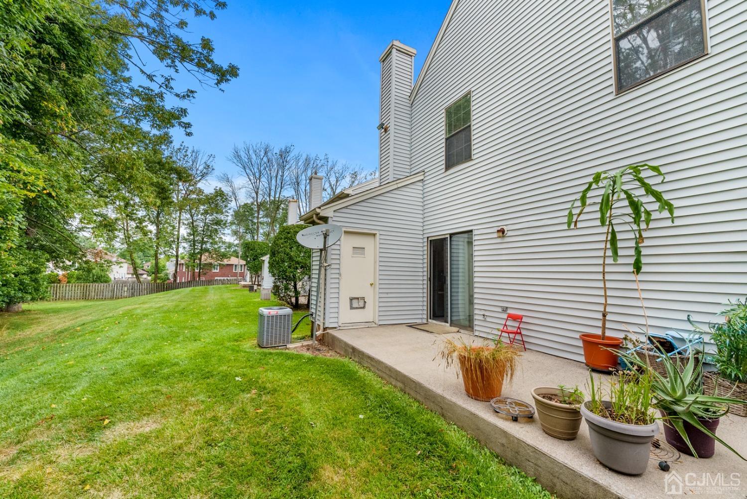 301 Maplecrest Road Edison, NJ 08820 - Photo 20 of 21 a view of a house with backyard and sitting area