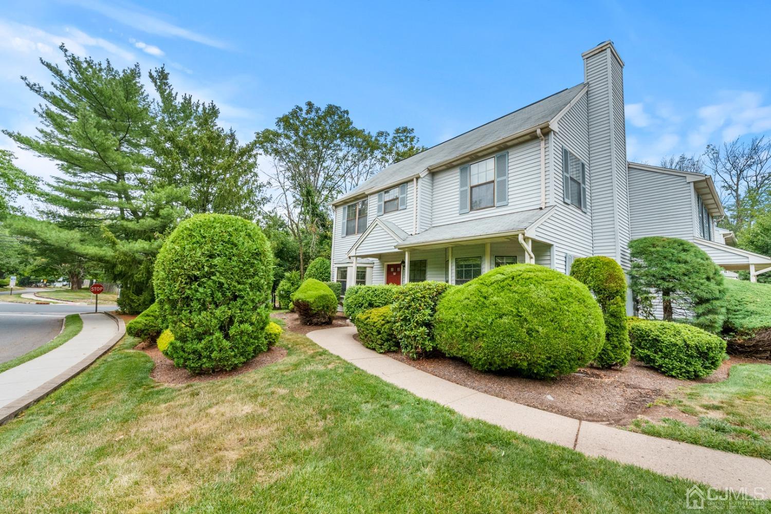 301 Maplecrest Road Edison, NJ 08820 - Photo 2 of 21 a front view of a house with garden