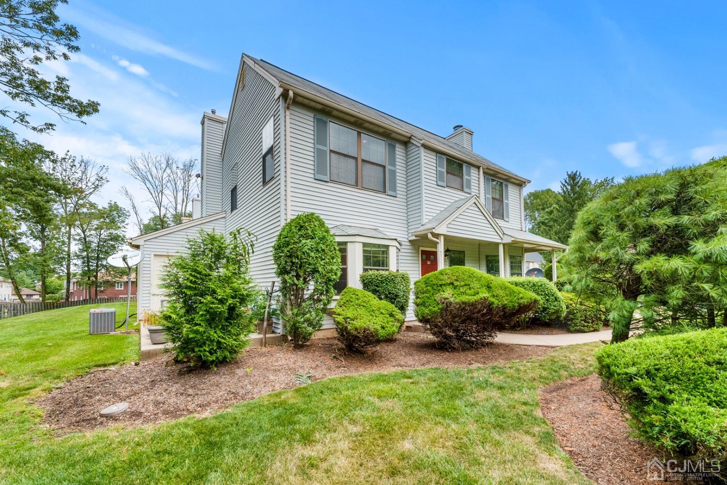 301 Maplecrest Road Edison, NJ 08820 - Photo 21 of 21 a front view of a house with garden