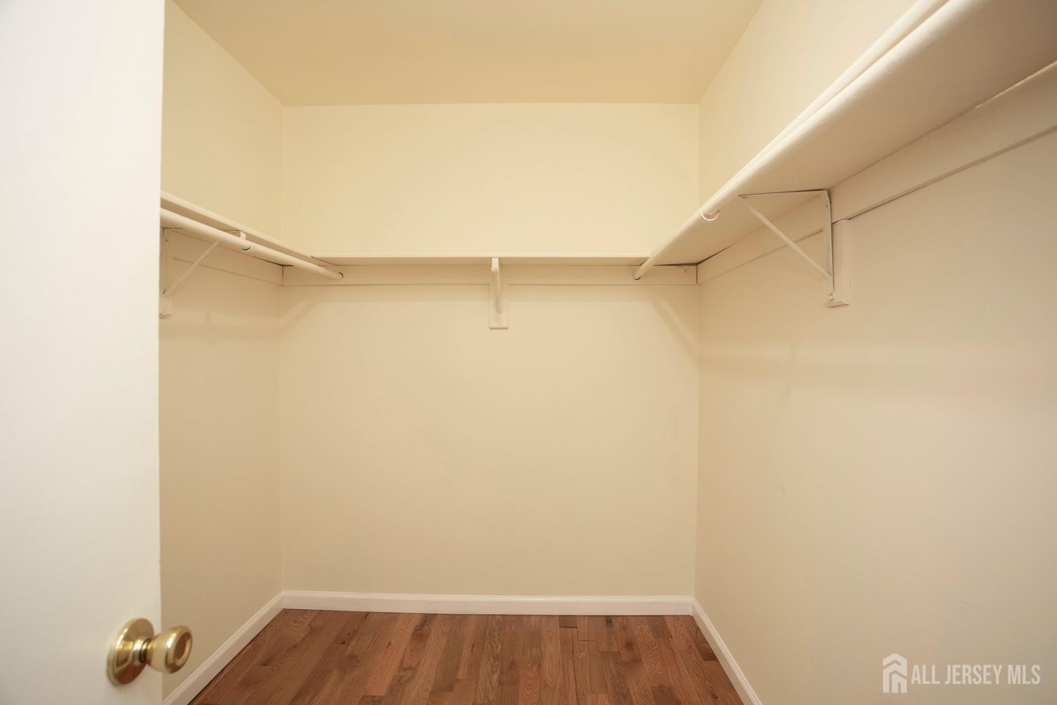 7 Cactus Court Edison, NJ 08820 - Photo 15 of 38 a view of a room with wooden floor