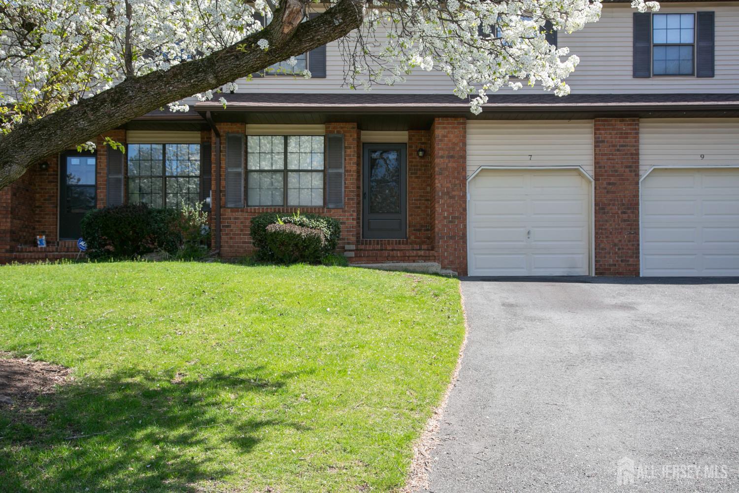 7 Cactus Court Edison, NJ 08820 - Photo 2 of 38 a view of a house with a yard and plants