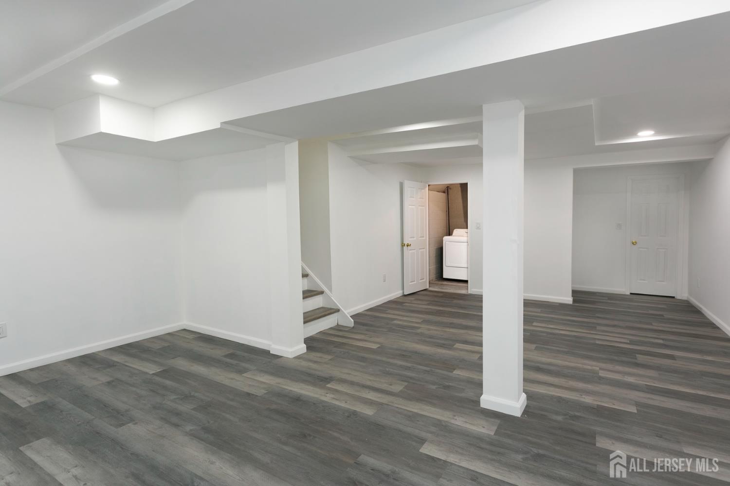 7 Cactus Court Edison, NJ 08820 - Photo 23 of 38 a view of a hallway with wooden floor