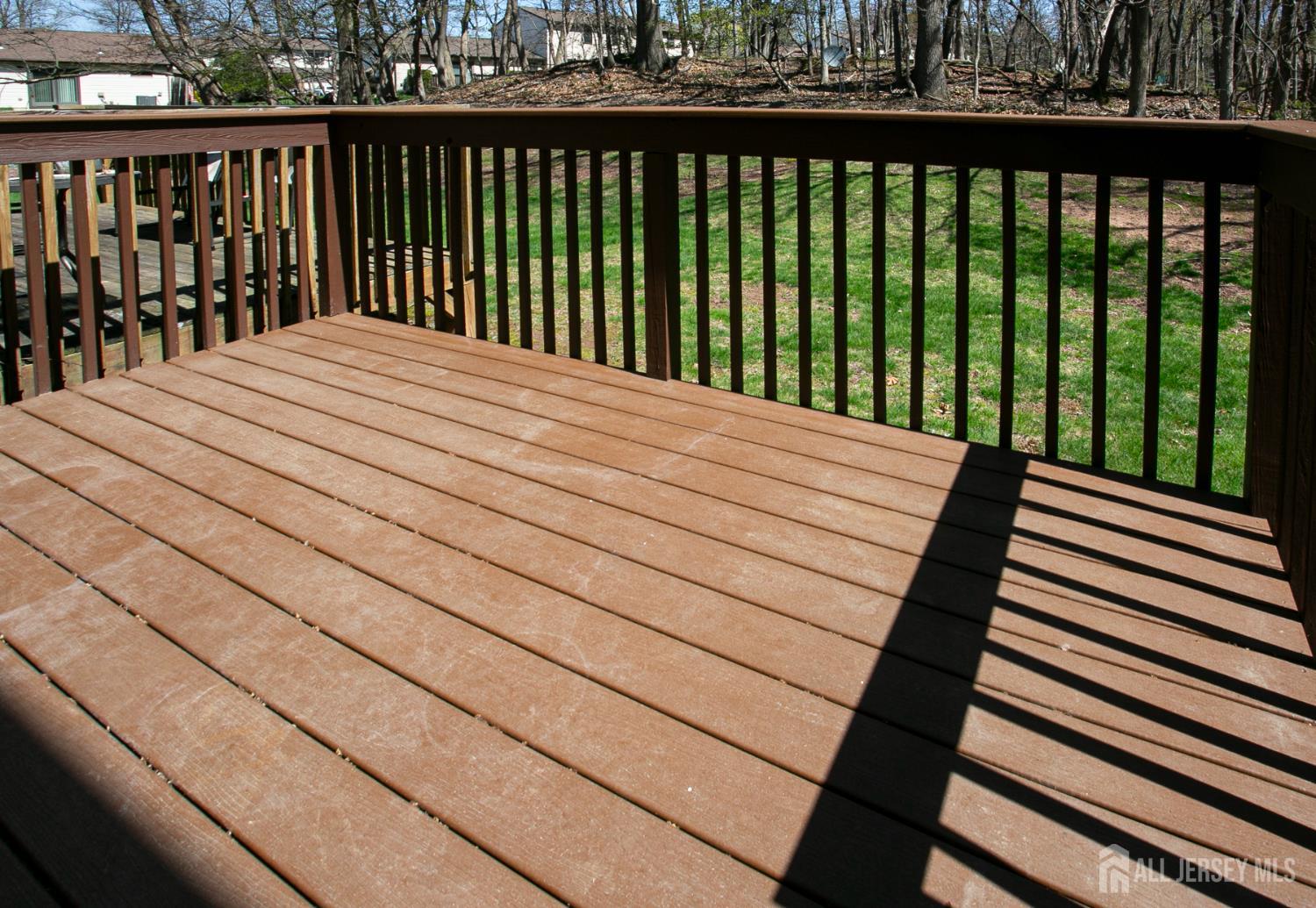 7 Cactus Court Edison, NJ 08820 - Photo 29 of 38 a balcony with wooden floor