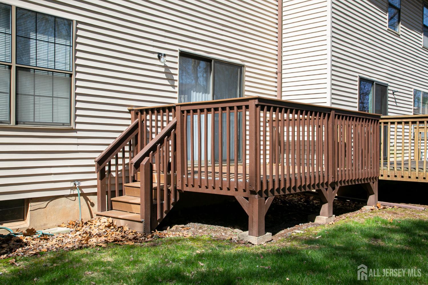 7 Cactus Court Edison, NJ 08820 - Photo 30 of 38 a view of a house with a backyard
