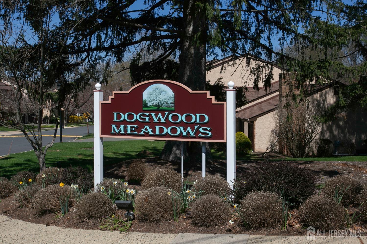 7 Cactus Court Edison, NJ 08820 - Photo 32 of 38 a view of a street sign under a large tree