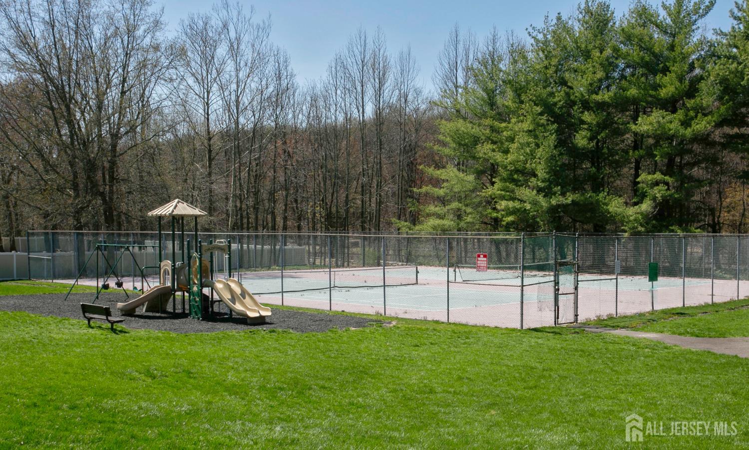 7 Cactus Court Edison, NJ 08820 - Photo 34 of 38 a view of park with a slide