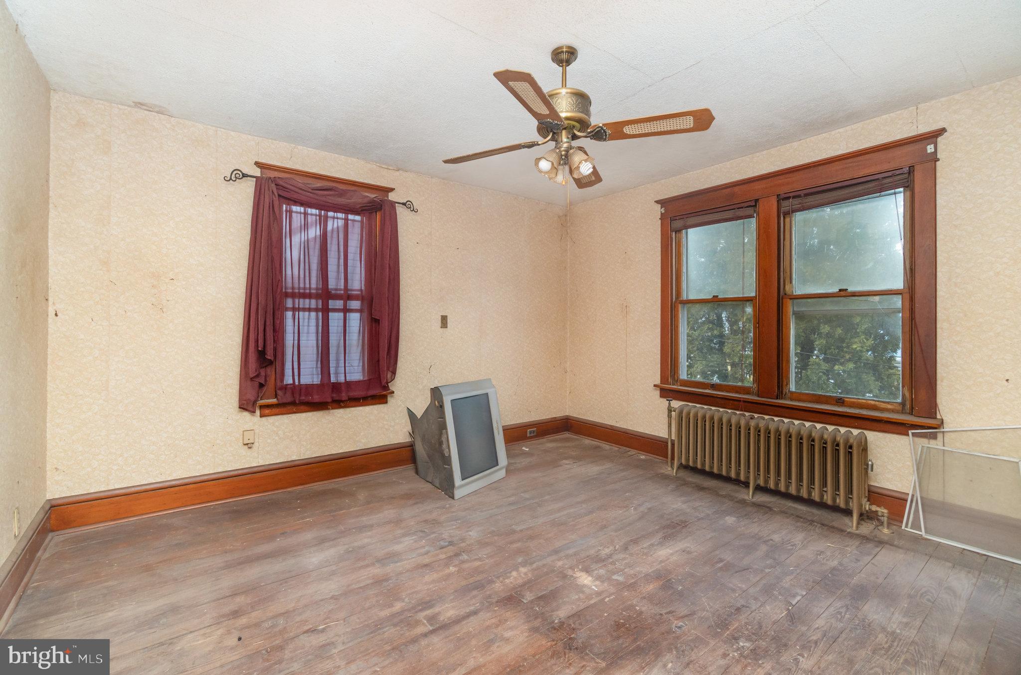 770 Main Street Lykens, PA 17048 - Photo 14 of 26 an empty room with windows