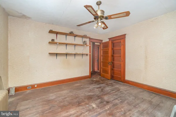 a view of an empty room and window