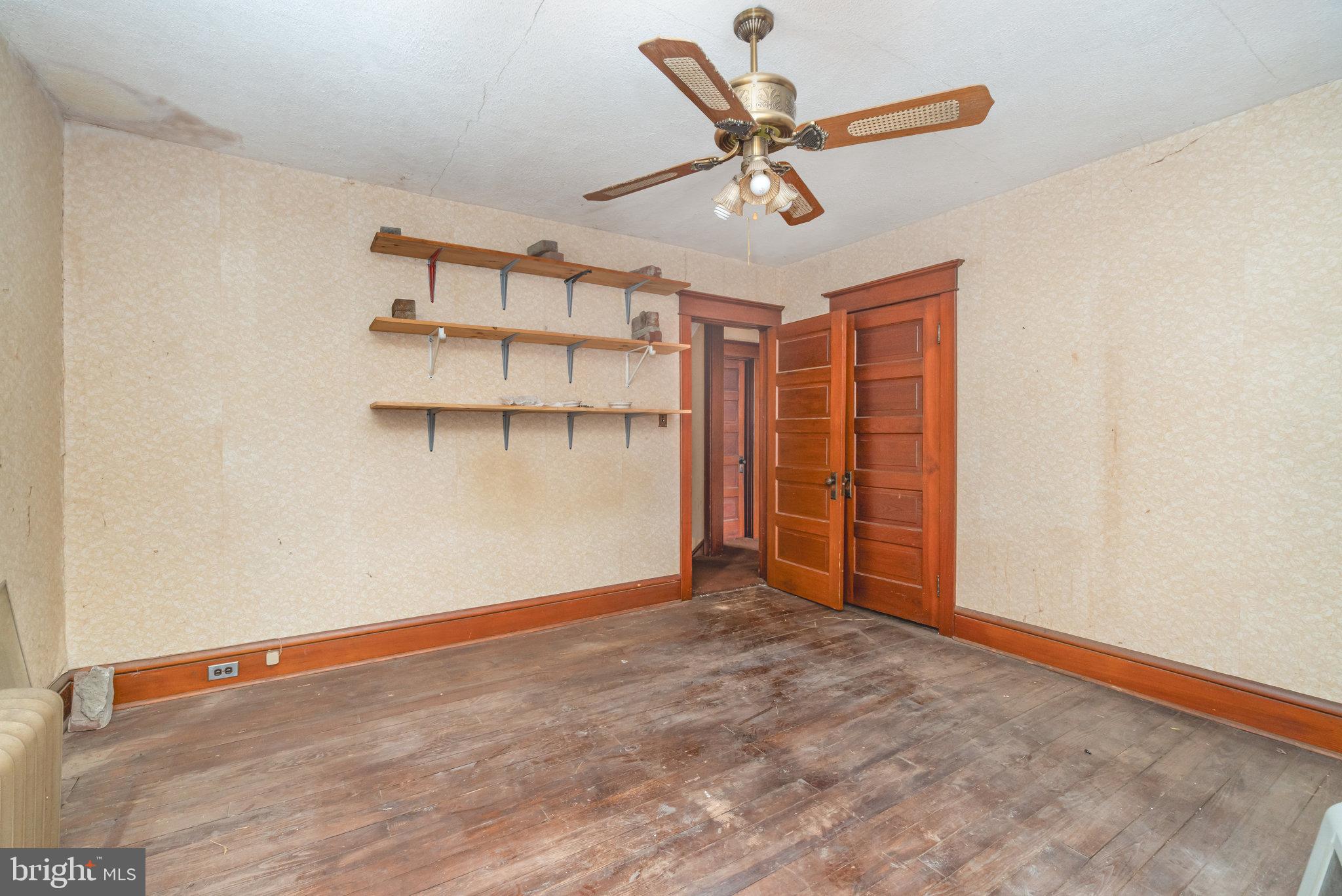 770 Main Street Lykens, PA 17048 - Photo 15 of 26 an empty room with a empty space and wooden floor